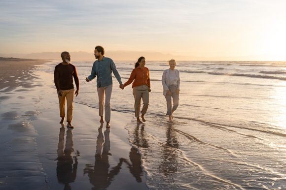 Family walking on beach