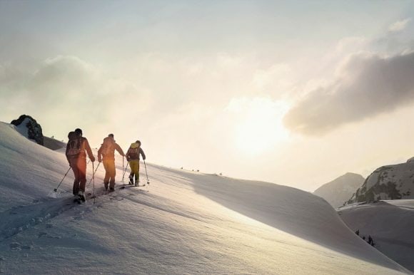 Person trekking in the winter forrest