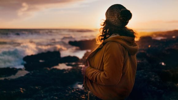 woman staring at the sea