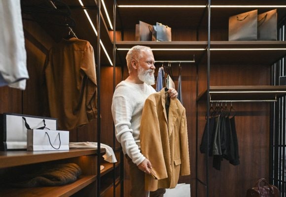 Senior man buying clothes