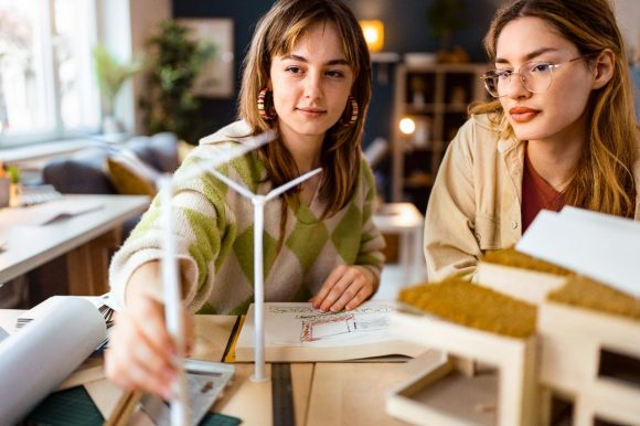 Two young women collaboration