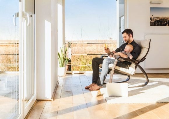 A young father is trying to decide whether to invest his savings in amortizing his home or in other financial assets to build up wealth.