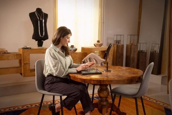 Two women talking at the office table