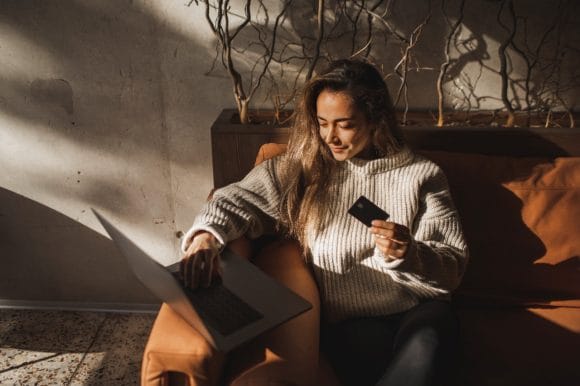  Woman doing online shopping from home