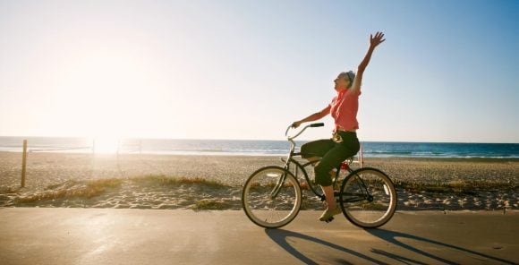 Pair of addults in the back of the van watching the map