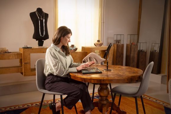 Two women talking at the office table