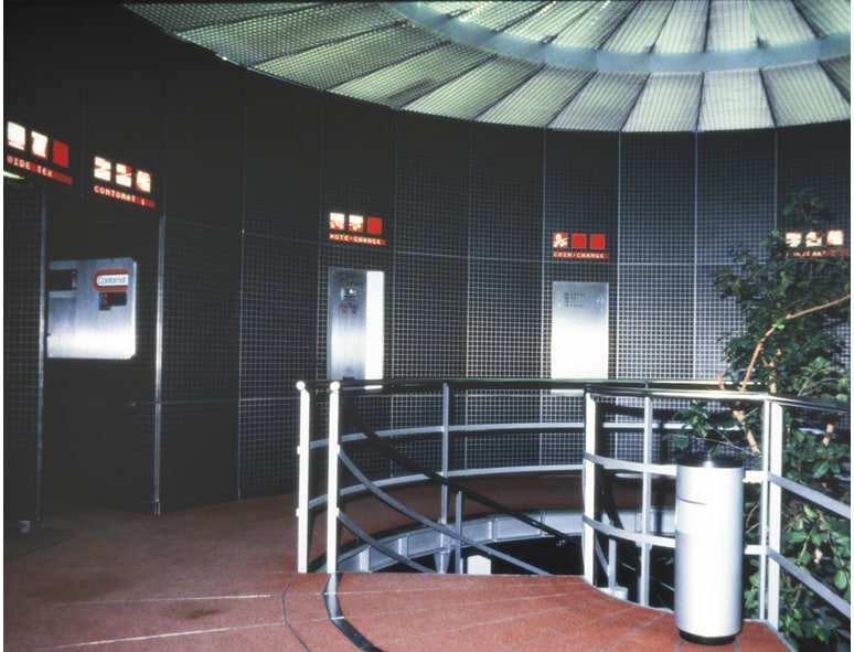 A spiral staircase and a transparent panoramic elevator
