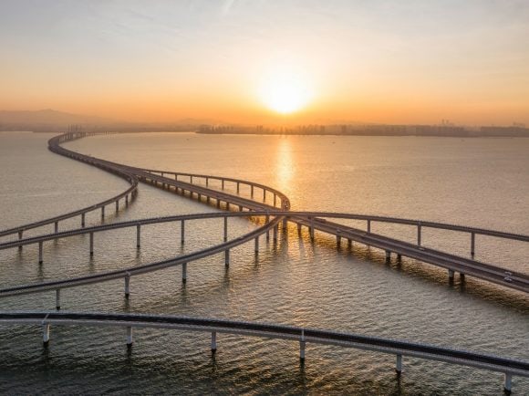 Scenic view of Jiaozhou Bay Bridge at sunrise.