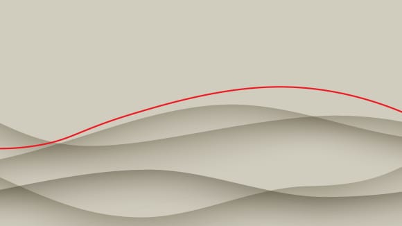 La ligne rouge traverse les vagues.