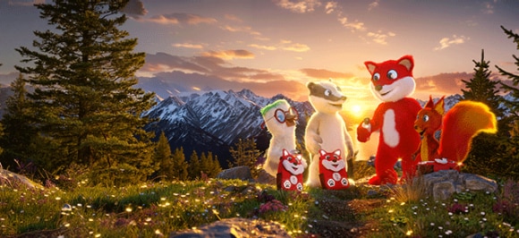 L’image montre Topsy et ses amis debout sur une colline au lever du soleil, avec leurs nouveaux sacs à dos pour enfants Topsy.