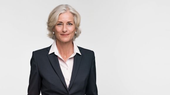 Portrait of a smiling woman.