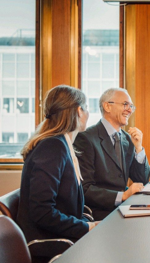 Senior man talking to client advisor