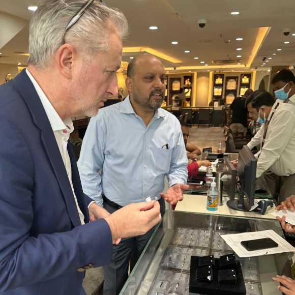 Two UBS employees at a Jewelry shop, looking at diamonds