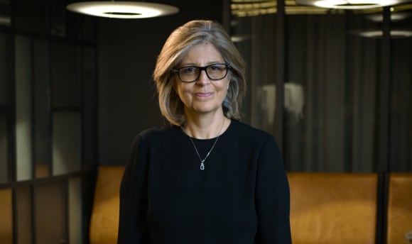 Mitra presenting on the stage