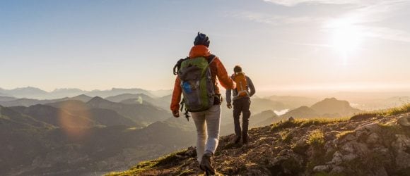 Two people hiking in mountains