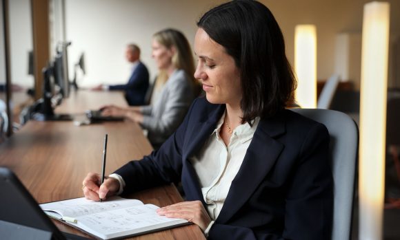 Off-Cycle internship participant working at desk