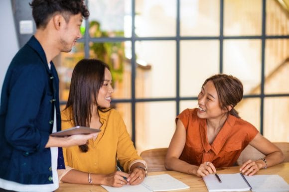 Young colleagues having conversation