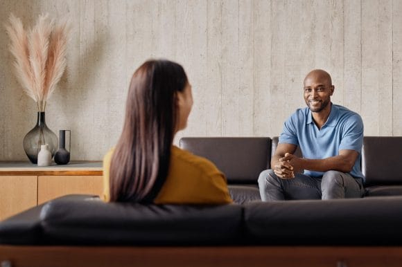 Two colleagues are discussing