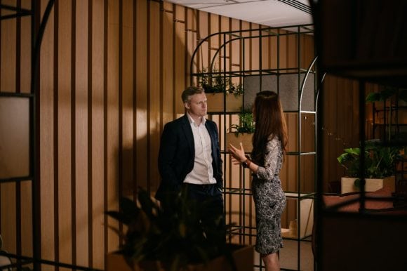 Two colleagues are discussing