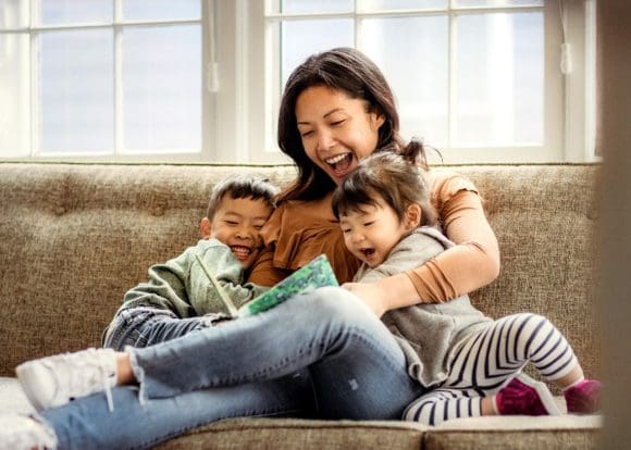 Mother reading to kids