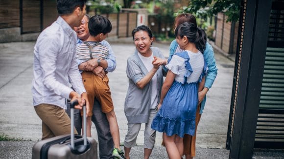 family entering hotel in japan