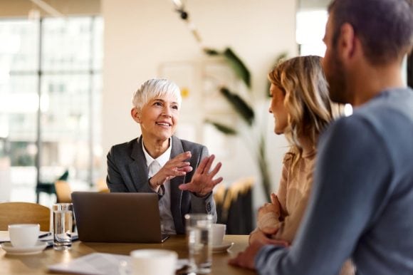 a senior bank executive speaking with clients