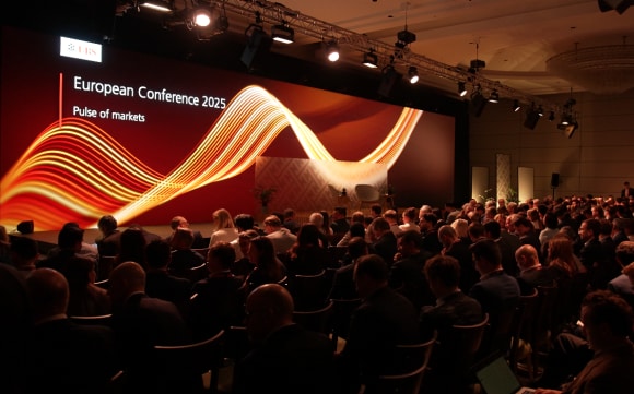 Image of large conference stage at the UBS European Conference 2026 in London