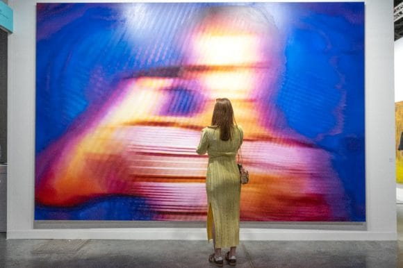 Woman admiring artwork