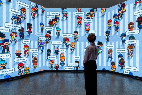 Person viewing cartoon wall