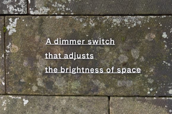 A dimmer switch that adjusts the brightness of space