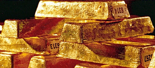 Piled gold bars