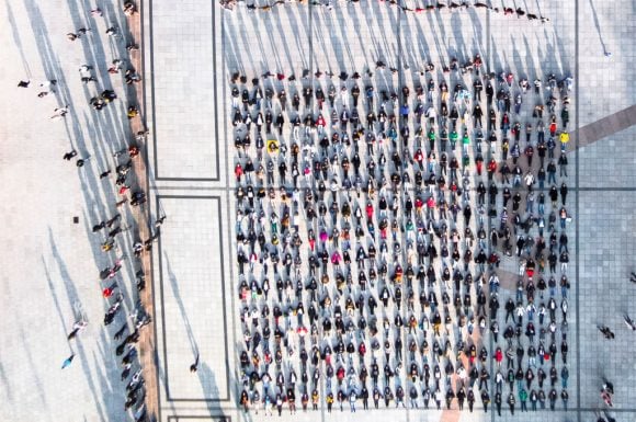 Drone view of a square with many people 