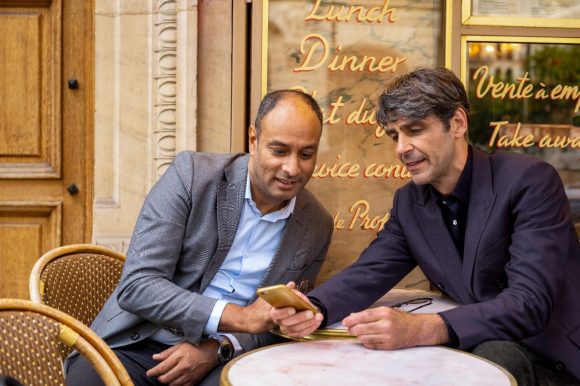 Two friends discussing