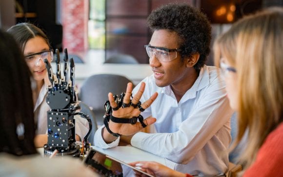 Students learning robot technology