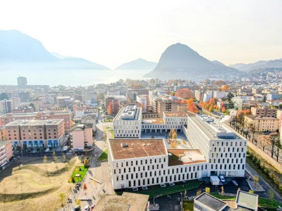 Cityscape with buildings and mountains