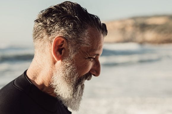 Man looking down sideways