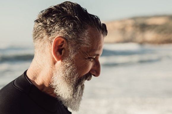 Man looking down sideways