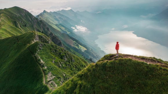 Woman looking at hills and mountains