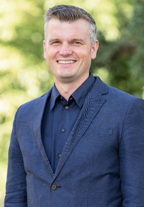 Portrait of Tom Hall, CEO UBS Optimus Foundation