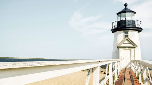 Lighthouse on sandy beach