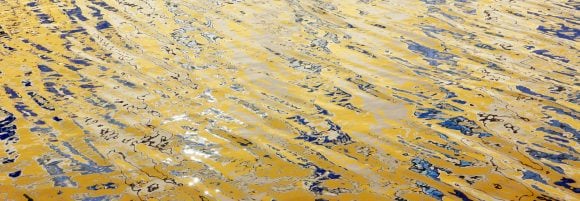 Abstract image: Wave of gold shimmer