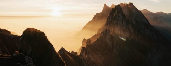 A bridge with a boat in the water
