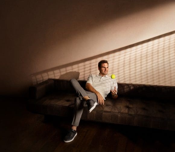 Roger Federer sitting on couch