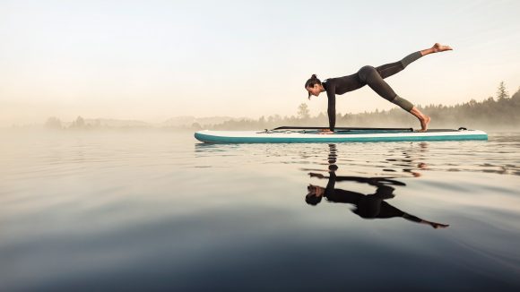 Women yoga surf board