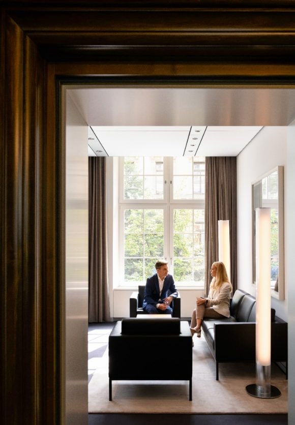 Two people having meeting at UBS headquarter Bahnhofstrasse 45, Zurich