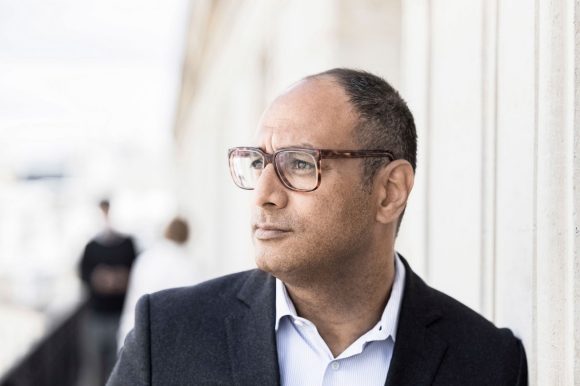 Portrait of a man with glasses outside, Paris