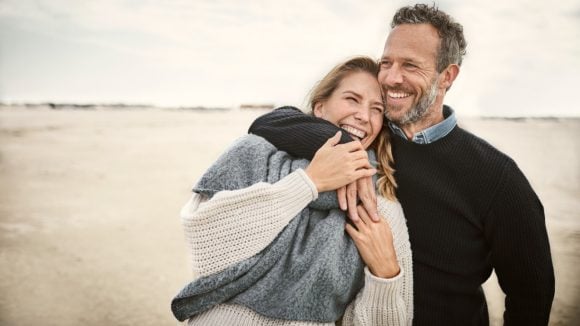 Couple standing on a beach