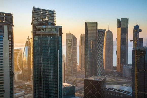 Doha skyline and fishing boats
