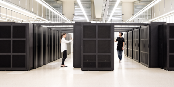 Server room with several workers
