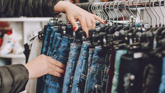 man confirming something on iphone